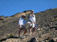 Two young ladies who climb high for a view and lunch every year.