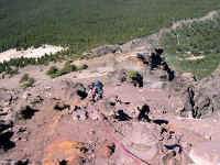 Down climbing dangerous slopes. At this point, I dropped 
my new digital camera which bounded down and smashed on the rocks below! This was not our day-